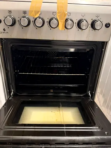Used freestanding gas oven and stove — good working condition