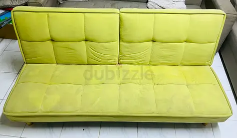 Used lime green convertible sofa bed — compact and comfy