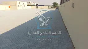 A 20,000 sq. ft. yard is available for rent with direct frontage on the main road in Sharjah. The pr