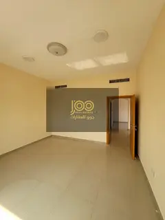 An apartment featuring two rooms and a spacious living area, complete with a balcony and central air