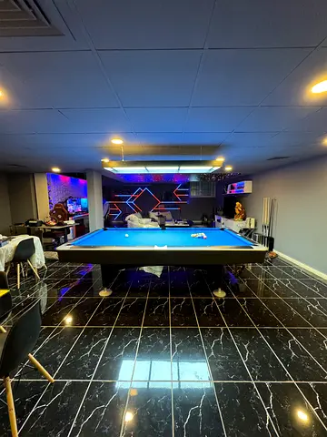 Full-size pool table in used condition with cues and accessories pool balls needs to be refurbished