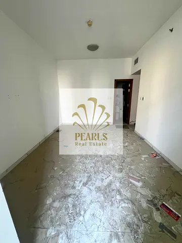 بلكونتان وغرفة نوم ماستر | غرفة وصالة مميزة في أبراج الواحة بالراشدية 1 عجمان | حمامان ومسبح وجيم وباركينج | للإيجار السنوي