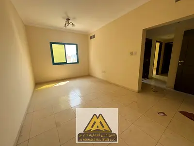 2BR apartment in Rashidiya 2, near Falcon Towers, 2 bathrooms, central AC. AED 35K yearly, 6 paymen