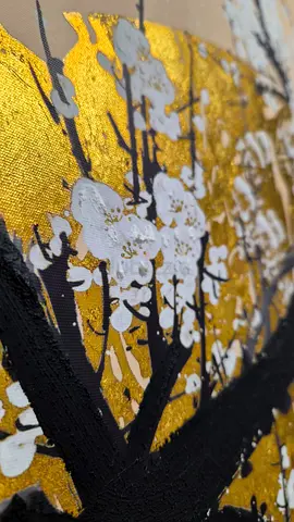 Hand-painted gold floral canvas artwork with textured blossoms