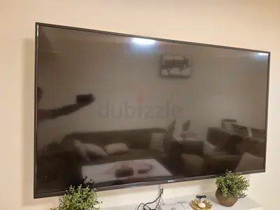 Nikai 55-65" LED Smart TV (Good Condition) - Wall Mounted