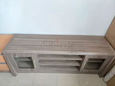 wooden TV unit cabinet with glass doors from Home centre excellent condition