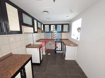 Luxury 1BR Apartment | balcony |Wardrobes | Covered Parking | Near New Muwaileh Park