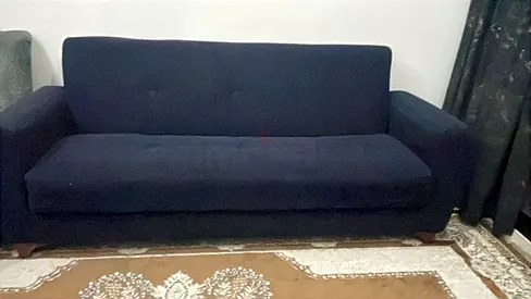 Simple 3-seater navy blue sofa in good used condition