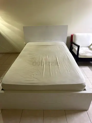 Single bed frame with mattress, light wood finish
