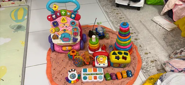 Bundle of Baby Activity Toys — walker, stacking rings, xylophone and more