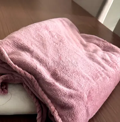 Soft pink fleece throw blanket - good condition single bed size