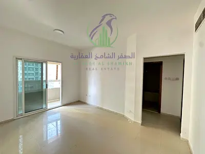 أرخص غرفة وصالة بالتعاون، بلكونة، سكن عائلي، بدون تأمين، 4 أو 5 شيكات، موقع مميز على مخرج دبي مباشرة.
