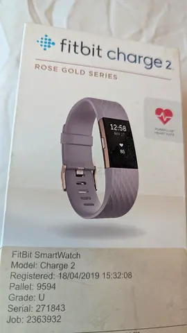 Fitbit Charge 2 (Rose Gold) with original box - used no strap