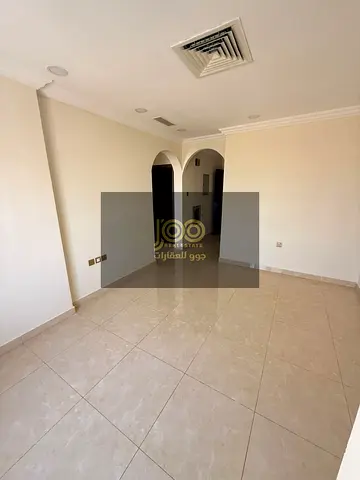 An excellent apartment consisting of a bedroom, a living room, and a bathroom; located behind the P
