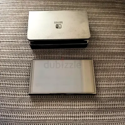 Nintendo Switch OLED + Extra controller + Game ( Used Once, Flawless)