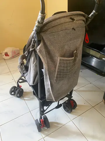 Lightweight grey standard baby stroller in good condition