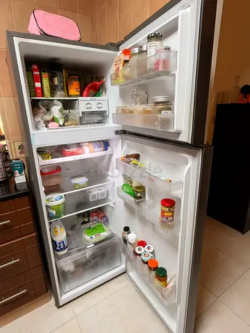 Used Double-Door Refrigerator with Freezer — Good Working Condition