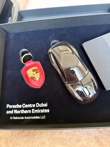 Porsche-branded wireless mouse with leather key fob with gift box. Brand new