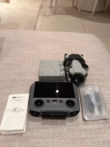 DJI Mini 4 Pro fly more combo rc 2 with Controller and Extra Battery - amazing new Condition