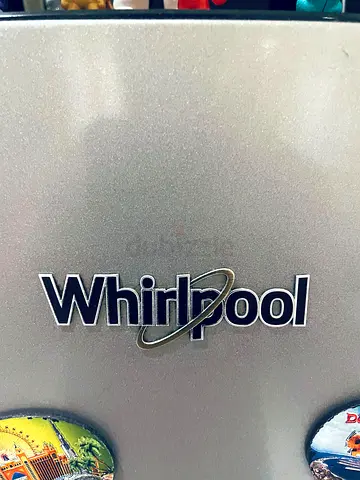 Whirlpool appliance — stainless finish with logo (used)