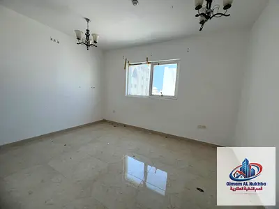 First-occupant 1BR in Al Qulayaa, AED 30K, master bedroom, 2 bathrooms, 1 month free, parking, 4/6 payments, family-only, near Al Heera Corniche.