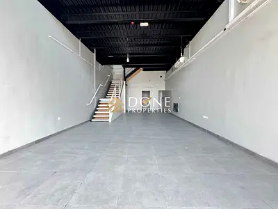 Easy access Dubai Ajman 30 days free luxury showroom Mazzine floor office space 16 kw electricity 3 parking ready to move 110k
