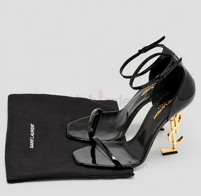 Authentic Black patent Saint Laurent Opyum heels with gold YSL logo heel, with dust bag and invoice