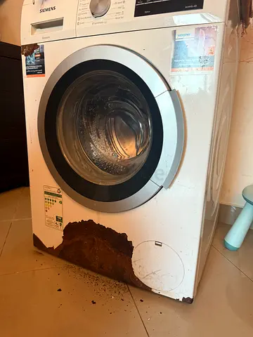 Siemens front-load washing machine -  front panel rusted , works 100% fine