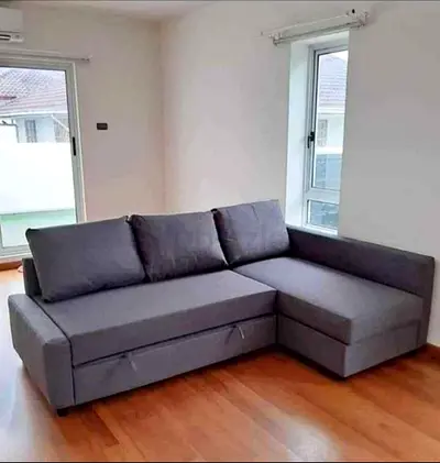 Grey L-shaped Corner Sofa with Storage - Good Condition