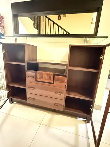 Brown wooden entertainment TV unit with glass top — good condition