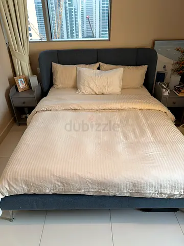 Blue-Grey upholstered double bed frame with padded headboard - very good condition