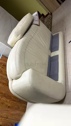Cream leather 3-seater sofa in good condition