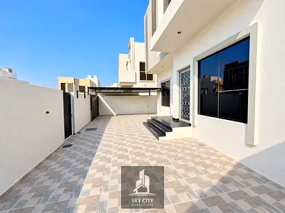 Luxury modern villa for sale in Ajman, featuring a Dubai-style design. Located behind the retail area with direct access to the 611 (Emirates Road).