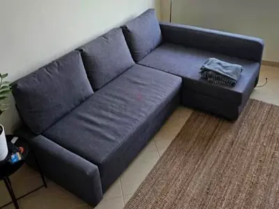 Dark grey L-shaped 3-seat sofa with chaise