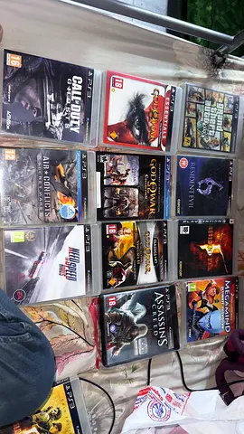 Super Slim 12GB Black + 2 Controllers + 12 Top Games - GTA V, $%& of War, COD, RE