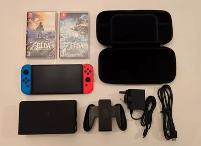 Nintendo Switch OLED + 2 Zelda Games + Travel Case