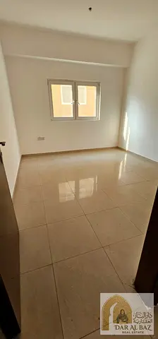 Two-bedroom apartment with a living room for annual rent in Al Nahda, Sharjah—located near Al Nahda Park. The rent is AED 42,000 per year