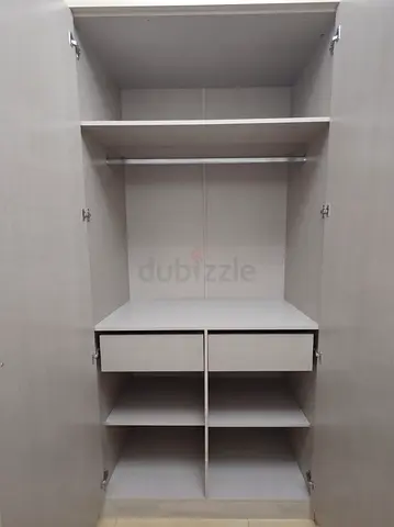 wood double-door wardrobe with drawers and shelves