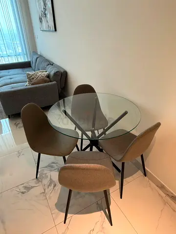 Glass Round Dining Table with 4 Grey Fabric Chairs - Compact Set