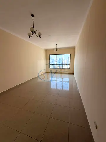 Three bedrooms and a living room for sale in Al Majaz 2, for residence or investment. The apartment has an open view and comes with tower services.