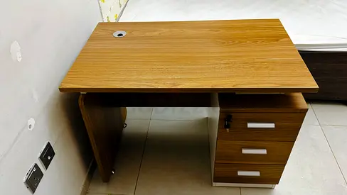Compact wooden study desk with 3 drawers — good condition
