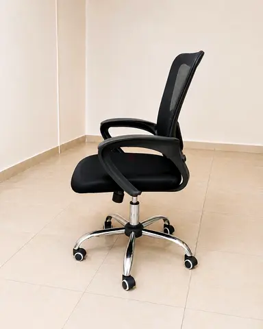 Black ergonomic mesh office chair with adjustable height and wheels