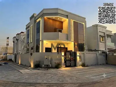 A luxurious villa for sale in Al Yasmeen, featuring a modern design and high-end finishes. The property comes equipped with air conditioning and is re
