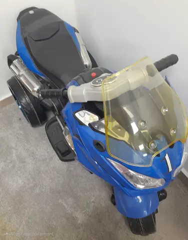Used Blue Electric Ride-On Toy Motorcycle for Kids - Good Condition