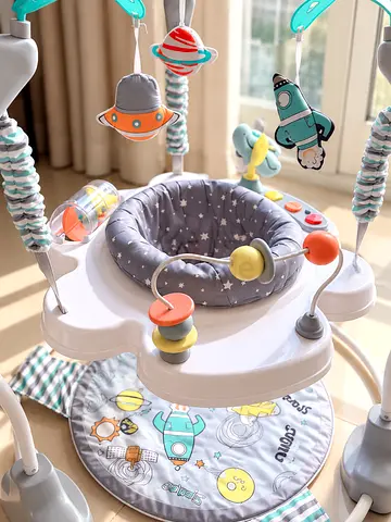 Baby activity jumper with space-themed toys — gently used
