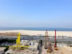Sea view luxurious apartment, featuring one bedroom, a living room, and an open balcony. Located on