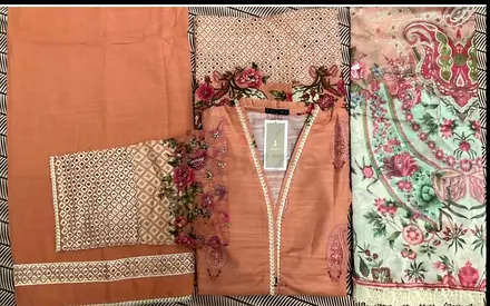 Peach embroidered ladies suite
