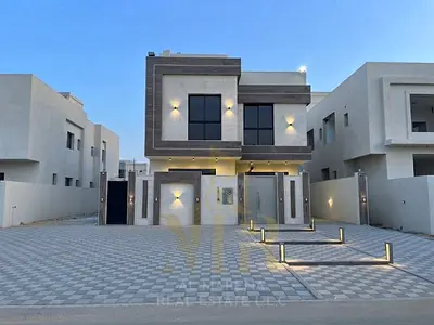 For sale: A luxurious VIP villa in Al Helio 1, Ajman. Features two floors plus a roof and central a