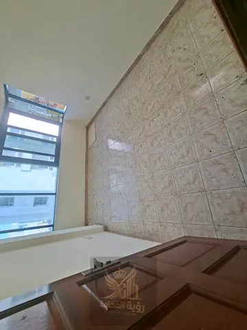 For Rent in Sharjah – Al Butina Two Bedroom Apartment with Living Room in a convenient location at an affordable annual rent.
