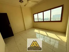 Studio for annual rent in Al Rashidiya 2 – Ajman | Separate kitchen and central air conditioning A